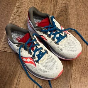 Saucony running shoes. Worn once on treadmill. Ride 14 running shoe.
